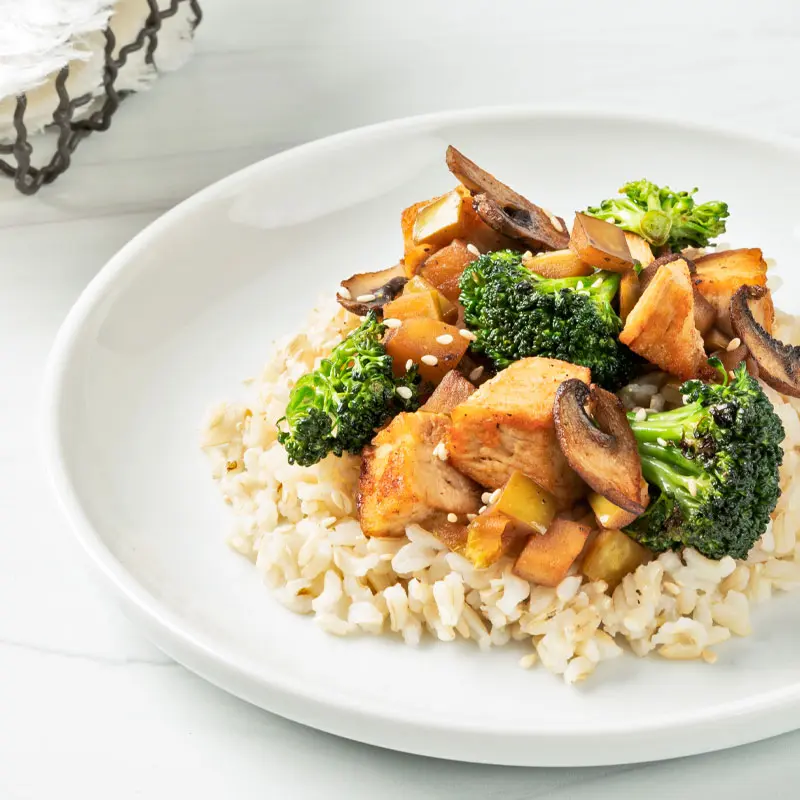 Stir fried chicken and vegetables with rice